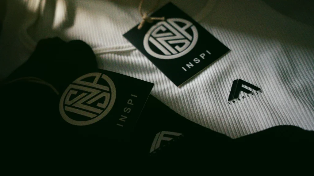 Branded labels on knit fabric for cashmere zip cardigan care and retail presentation