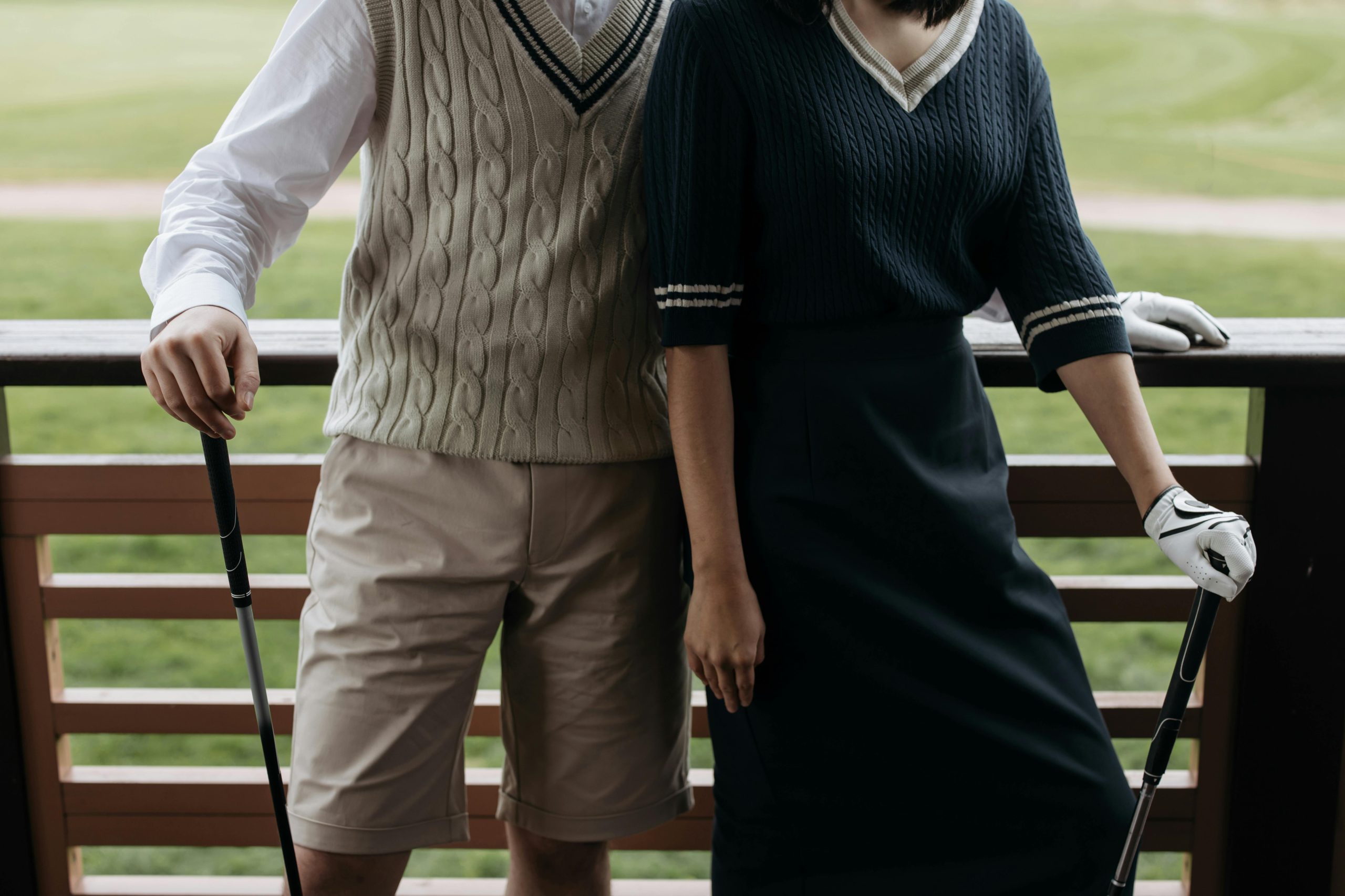 Custom vest knitwear with cable knit texture styled for outdoor golf-inspired apparel