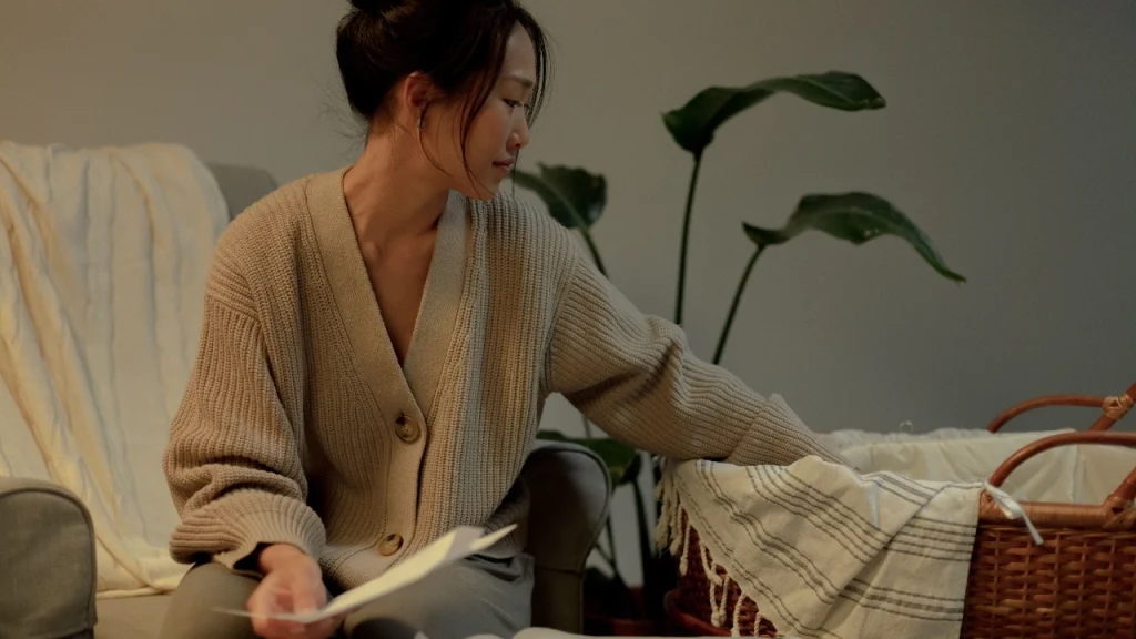Woman wearing a beige button cardigan for Wholesale Cardigan Sweaters lifestyle presentation