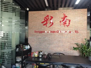 Cainan Clothing company logo wall in the office reception