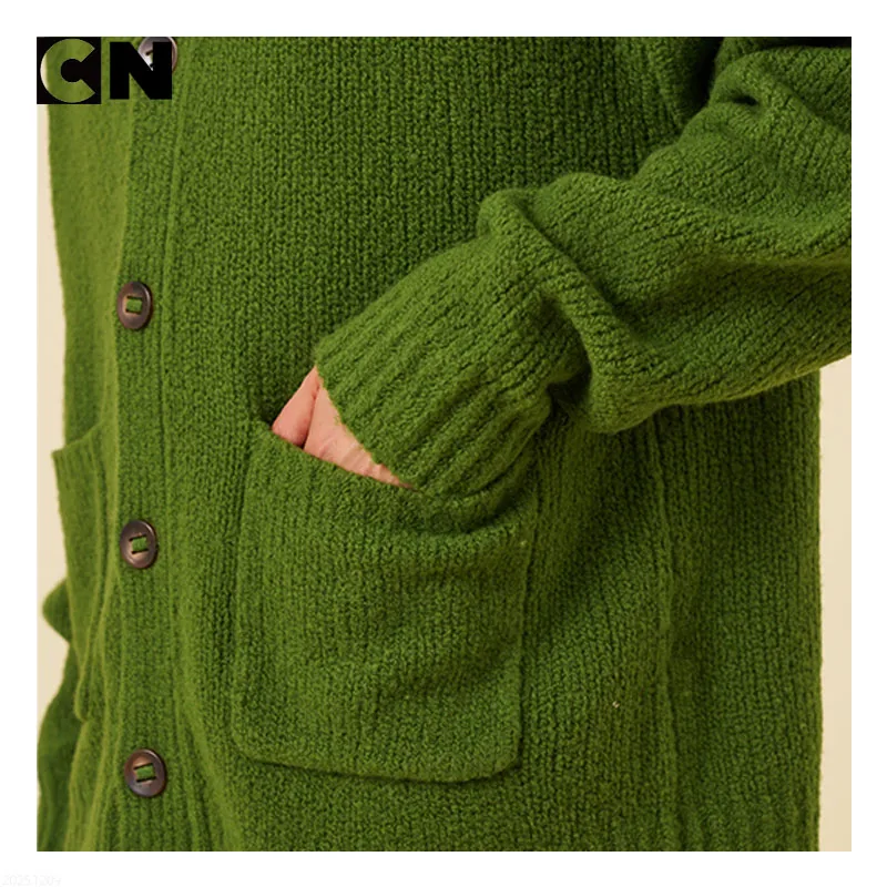 Close-up of cardigan patch pocket and buttons