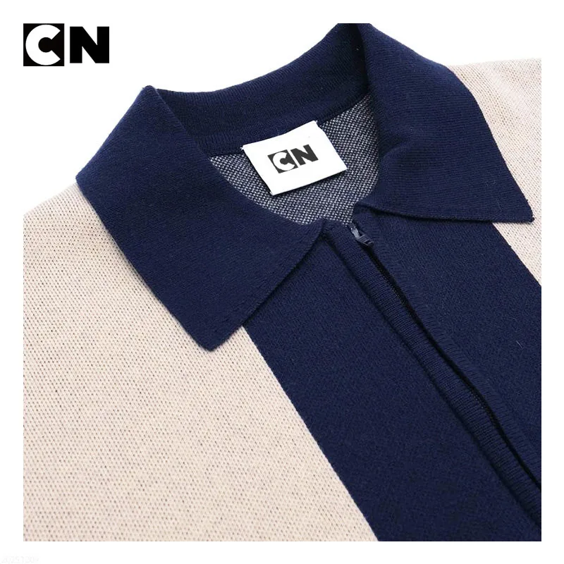 Collar detail of a vertical stripe knit polo
