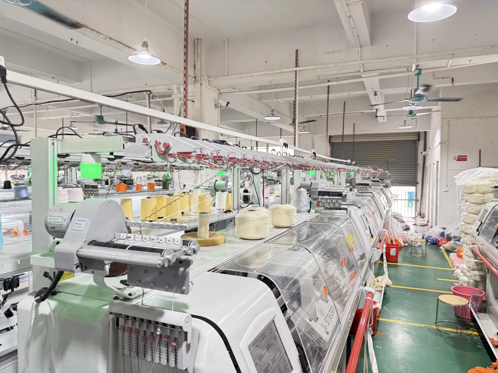 Flat knitting workshop at the Cainan factory in Dongguan