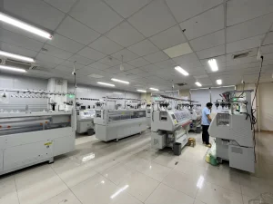 Wide view of the knitting workshop with computerized knitting machines
