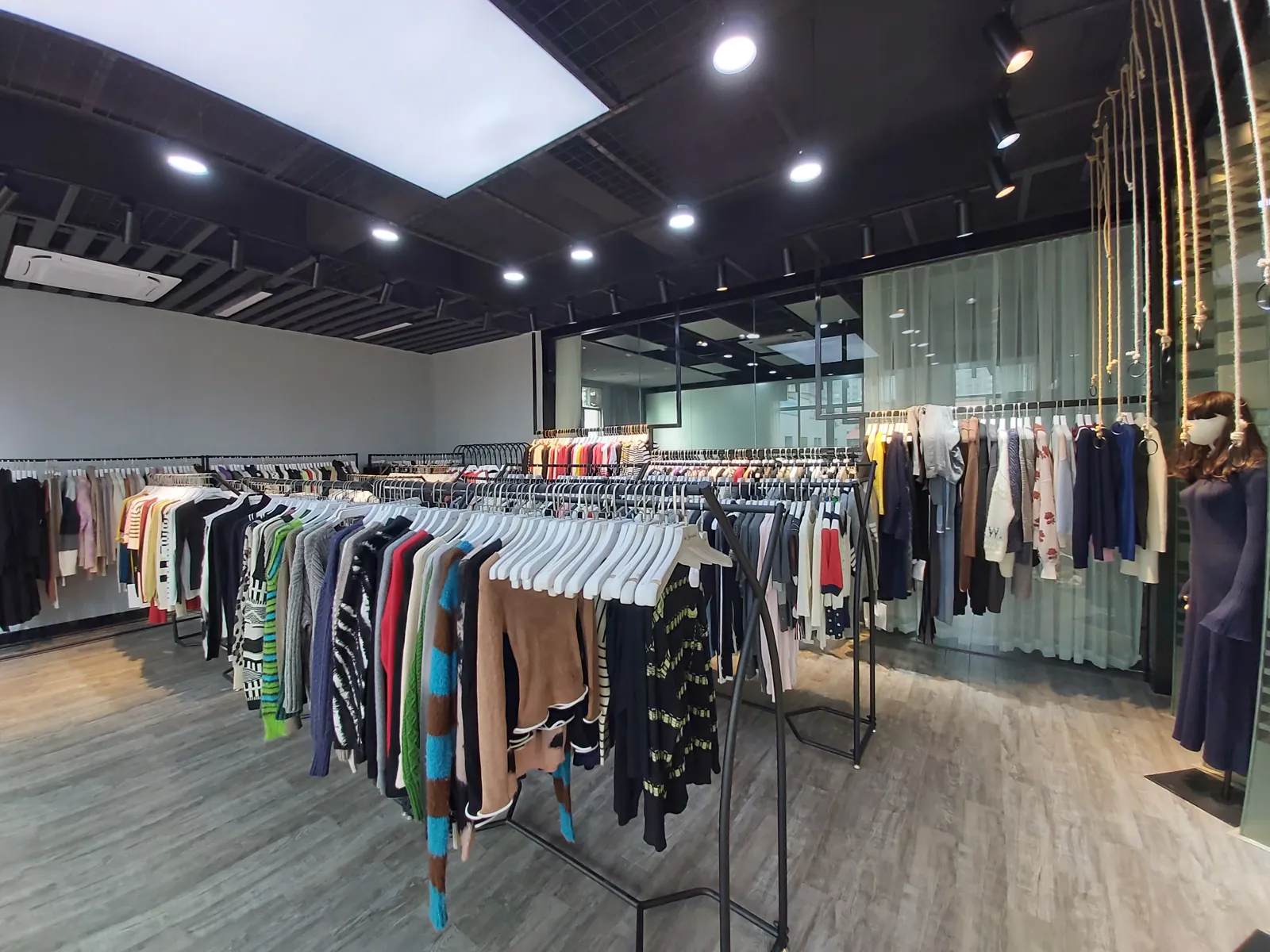 Knitwear sample racks in the Cainan showroom