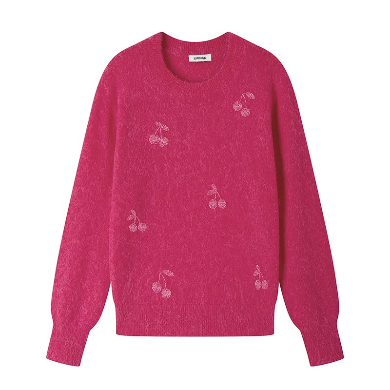 Pink knit sweater with cherry embroidery on the front