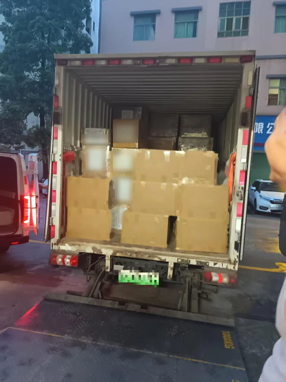 Private-label knitwear cartons loaded into a truck for delivery