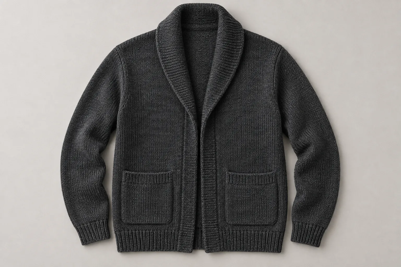 Charcoal shawl-collar cardigan laid flat with front bands and patch pockets