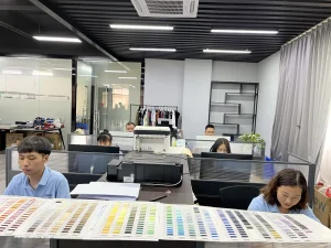 Development office with yarn color cards for knitwear orders